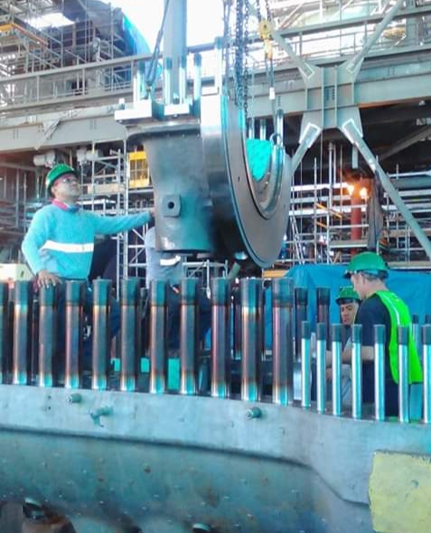 MTI engineers working on heavy industrial equipment